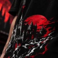 Close-up of Crimson Keep T-shirt gothic castle and crimson graphic